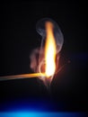 match flame dark background Royalty Free Stock Photo