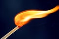 Match stick ignited burning bright big fire flame with smoke Royalty Free Stock Photo