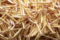 Match sticks with brown heads in a row. Texture Royalty Free Stock Photo