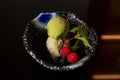 Matcha black sesame ice cream with berries in the kaiseki fine dining Japanese restaurant