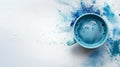 Matcha blue tea in cup on blue powder background with copy space. Creative trendy colors for modern design. Royalty Free Stock Photo