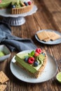 Matcha custard tart topped with fresh berries Royalty Free Stock Photo