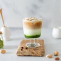 Matcha espresso. Trendy coffee drink with spirulina. Green tea coffee, matcha green tea with milk and coffee. Colorful layer drink Royalty Free Stock Photo