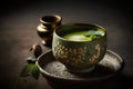 Matcha green tea in a bowl on a dark wooden background.