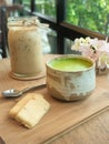 Matcha Green Tea and cookie on wooden tray Royalty Free Stock Photo