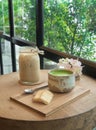 Matcha Green Tea and cookie on wooden tray Royalty Free Stock Photo