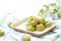 Matcha Green Tea Cookies Singapore or Matcha Green Tea cashew Cookies with dried flower blurred on green vintage background Royalty Free Stock Photo