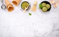 Matcha green tea ice cream with waffle cone and mint leaves  setup on white stone background . Summer and Sweet menu concept Royalty Free Stock Photo