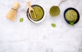 Matcha green tea ice cream with waffle cone and mint leaves  setup on white stone background . Summer and Sweet menu concept Royalty Free Stock Photo