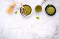 Matcha green tea ice cream with waffle cone and mint leaves  setup on white stone background . Summer and Sweet menu concept Royalty Free Stock Photo