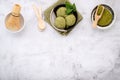 Matcha green tea ice cream with waffle cone and mint leaves  setup on white stone background . Summer and Sweet menu concept Royalty Free Stock Photo