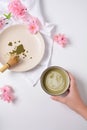 Matcha green tea latte in a bowl. Matcha is a powder of green tea leaves packed with antioxidants Royalty Free Stock Photo