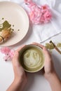 Matcha green tea latte in a bowl. Matcha is a powder of green tea leaves packed with antioxidants Royalty Free Stock Photo