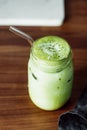 Matcha green tea latte in a glass jar Royalty Free Stock Photo