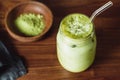 Matcha green tea latte in a glass jar Royalty Free Stock Photo