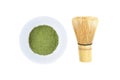 Matcha, green tea powder and bamboo whisk isolated on white Royalty Free Stock Photo