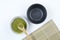 Matcha Japanese or Chinese powdered green tea. The brewing process. The beginning of the ceremony. Top view. Close-up. Place for
