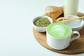 Matcha latte and accessories for making on white background Royalty Free Stock Photo