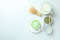 Matcha latte and accessories for making on white background Royalty Free Stock Photo