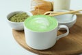 Matcha latte and accessories for making on white background Royalty Free Stock Photo