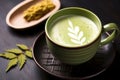 matcha latte with japanese kanji tea decoration