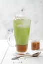 Matcha latte with salted caramel in tall glass Royalty Free Stock Photo