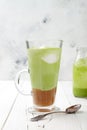 Matcha latte with salted caramel in tall glass Royalty Free Stock Photo