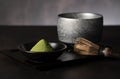 Matcha powder and green tea on dark background Royalty Free Stock Photo