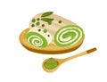 Matcha roll cake with white chocolate filling, served on wooden board with green tea powder. Airy sponge Japanese