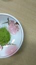 Matcha tea in a cup on a wooden table. Top view Royalty Free Stock Photo