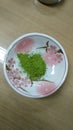 Matcha tea in a cup on a wooden table. Top view Royalty Free Stock Photo