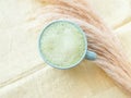 Matcha tea latte morning antioxidant hot drink in blue cup on yellow table cloth with pampas grass Royalty Free Stock Photo