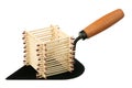 Matches on a building trowel Royalty Free Stock Photo