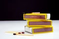 Matches with burnt and fresh match sticks Royalty Free Stock Photo