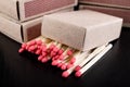 Matches for resurrecting fire in gray boxes. Old methods of lighting a fire Royalty Free Stock Photo