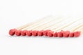 Matches in a row Standing out from the crowd concept. Match stick on white Royalty Free Stock Photo