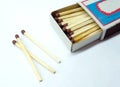 Matches on a white background close-up. Box of matches. Matches made of wood and sulfur. Royalty Free Stock Photo