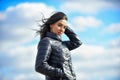 Matching style and class with luxury and comfort. Beauty and fashion look. Girl jacket cloudy sky background. Woman