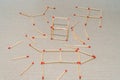 Matchstick figures on tabletop Royalty Free Stock Photo