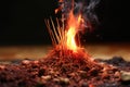 matchstick starting a pile of tinder alight for a bonfire Royalty Free Stock Photo