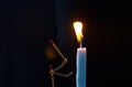 Matchsticks in form of a man lighting a candle, matchstick man lighting a candle. Royalty Free Stock Photo