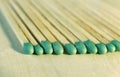 Matchsticks with green tips on a birch board macro close up Royalty Free Stock Photo