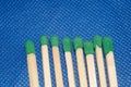 Matchsticks with a red heads with heart shaped match among others on a classic blue background. Royalty Free Stock Photo