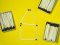 Matchsticks on a yellow background. Safe handling of fire. Fire dangers. Lots of matches. household still life. Pictures lined