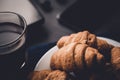 Mate moody color. concept of work. Top view. Macro shot of Smartphone and Laptop fresh croissants