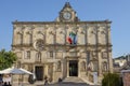 People walking in front of Lanfranchi palace at Matera on Italy