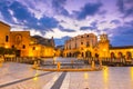 Matera, Italy, Vittorio Veneto square: Night view of the St. Domenico church and Materdomini church over the Hypogeum ruins Royalty Free Stock Photo