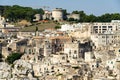 Sassi historic district in Matera with Tramontano castle on the top of the hill, Basilicata, Italy Royalty Free Stock Photo