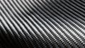 Material of composite product dark carbon fiber. Royalty Free Stock Photo