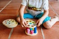 A material of montessori pedagogy, a new style of teaching children in schools around the world, with wooden educational toys Royalty Free Stock Photo